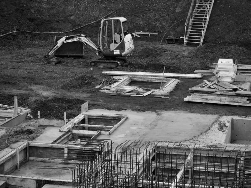 3 Ton Mini Excavator: When to Step Up from 2.5 Ton - mini excavator working on a construction site
