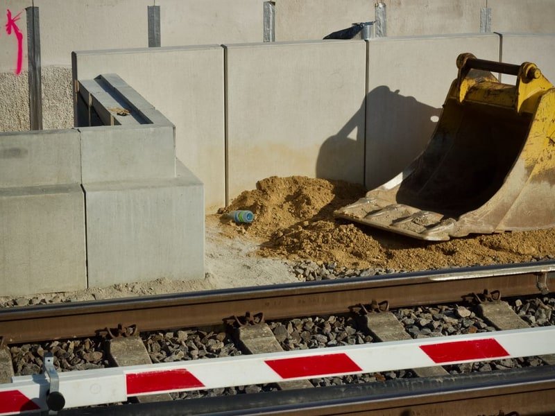 Can a Mini Excavator Remove Concrete? - excavator maintenance and undercarriage inspection