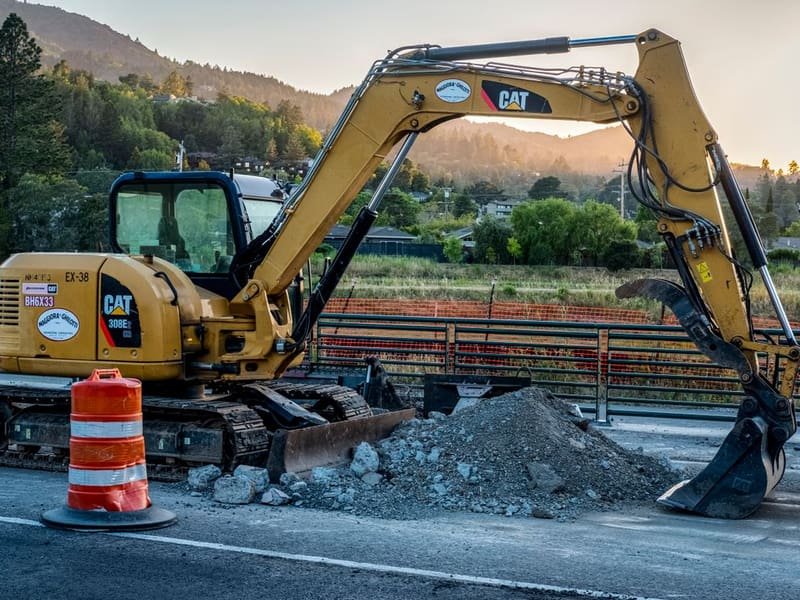 How to Dig a Trench with a Mini Excavator - mini excavator working on a construction site