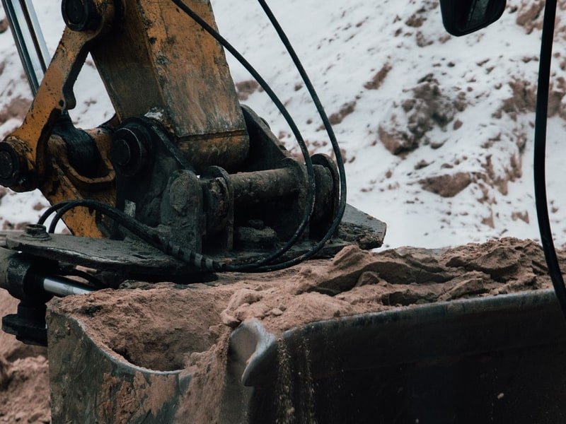 How to Get a Mini Excavator Unstuck - excavator maintenance and undercarriage inspection