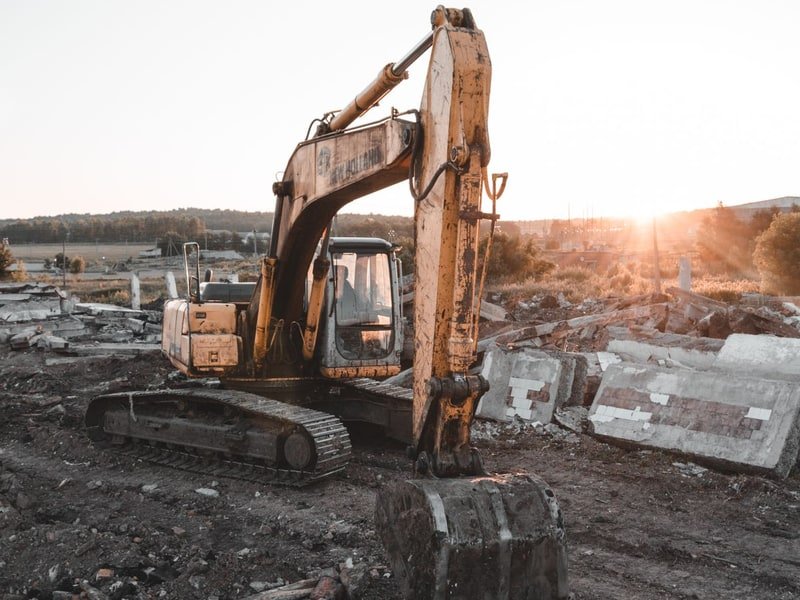 How to Use a Mini Excavator: Controls and First Tasks - excavator digging and earthmoving