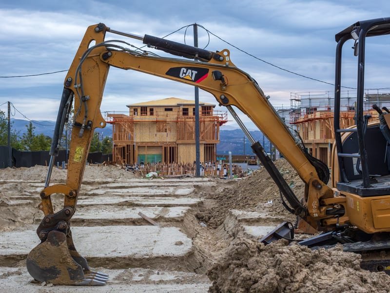 Micro Excavator for Sale: Tight Access Buying Guide - mini excavator working on a construction site