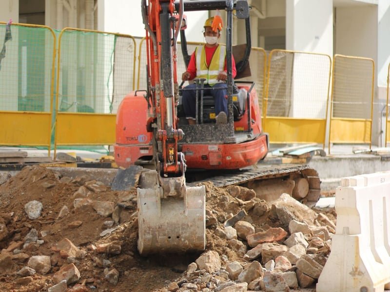 Micro Mini Excavator: Best for Tight Access - mini excavator working on a construction site
