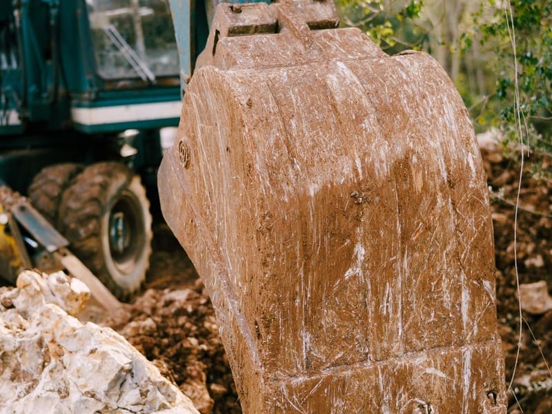 Mini Excavator Bucket: Width and Capacity Guide - mini digger working on site