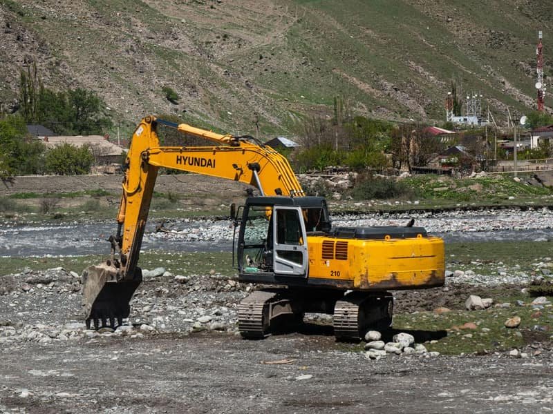 Mini Excavator with Attachments: Package Buying Guide - mini excavator attachment in use