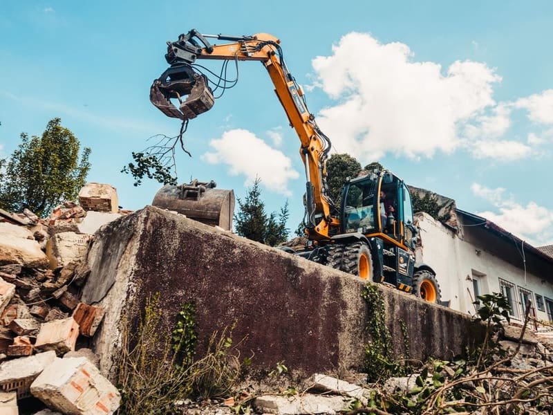Mini Excavators for Sale: 1-3 Ton Model Comparison - mini excavator working on a construction site