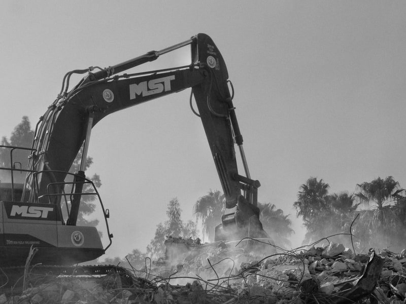 Used Mini Excavator Buying Guide: Hours and Inspection - excavator digging and earthmoving
